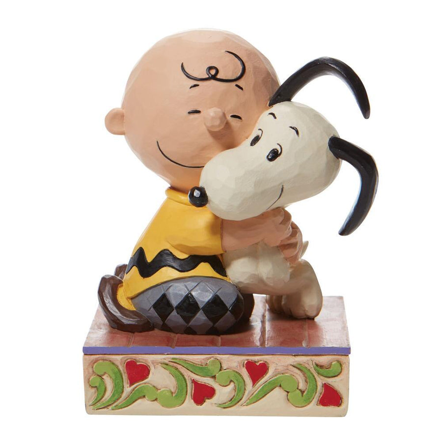 Jim Shore Peanuts: Charlie Brown Hugging Snoopy Figurine sparkle-castle