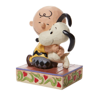 Jim Shore Peanuts: Charlie Brown Hugging Snoopy Figurine sparkle-castle