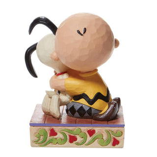 Jim Shore Peanuts: Charlie Brown Hugging Snoopy Figurine sparkle-castle