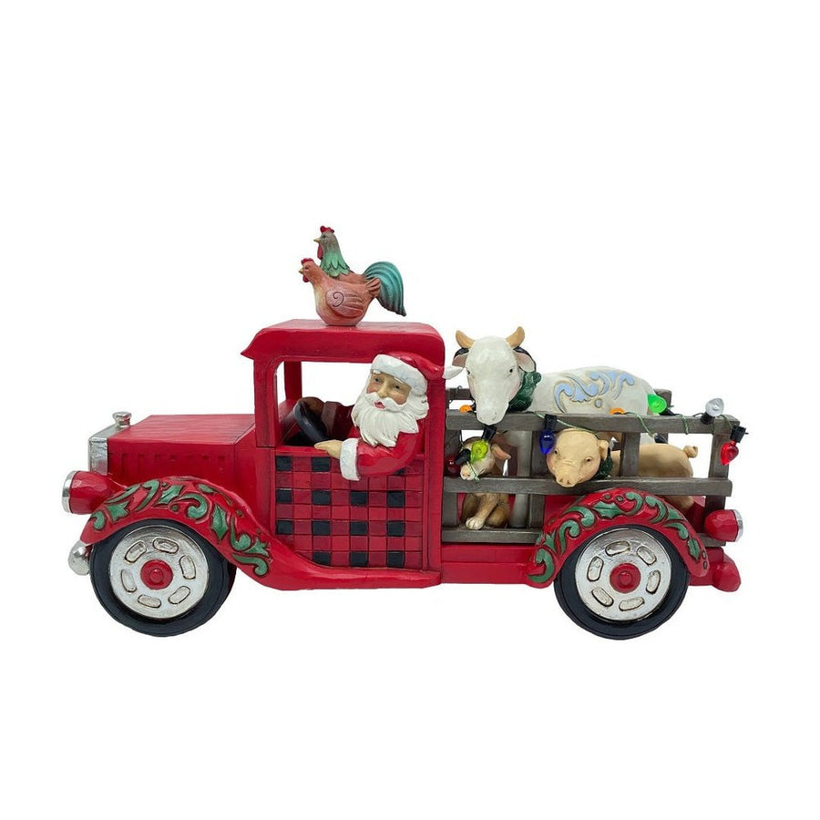 Jim Shore Country Living: Santa Driving Red Truck Figurine sparkle-castle