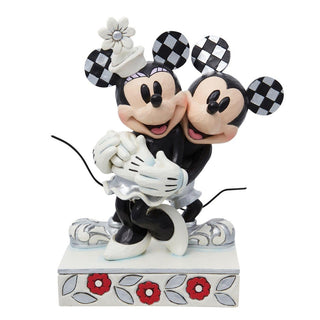 Jim Shore Disney Traditions: 100th Anniversary Mickey Holding Minnie Figurine sparkle-castle