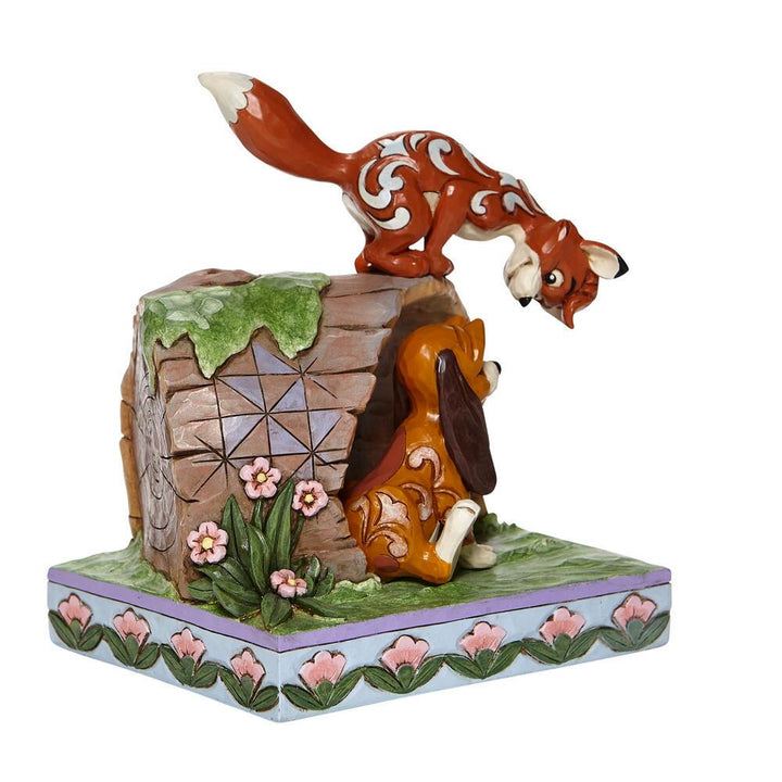 Jim Shore Disney Traditions: Fox Hound Log Figurine sparkle-castle