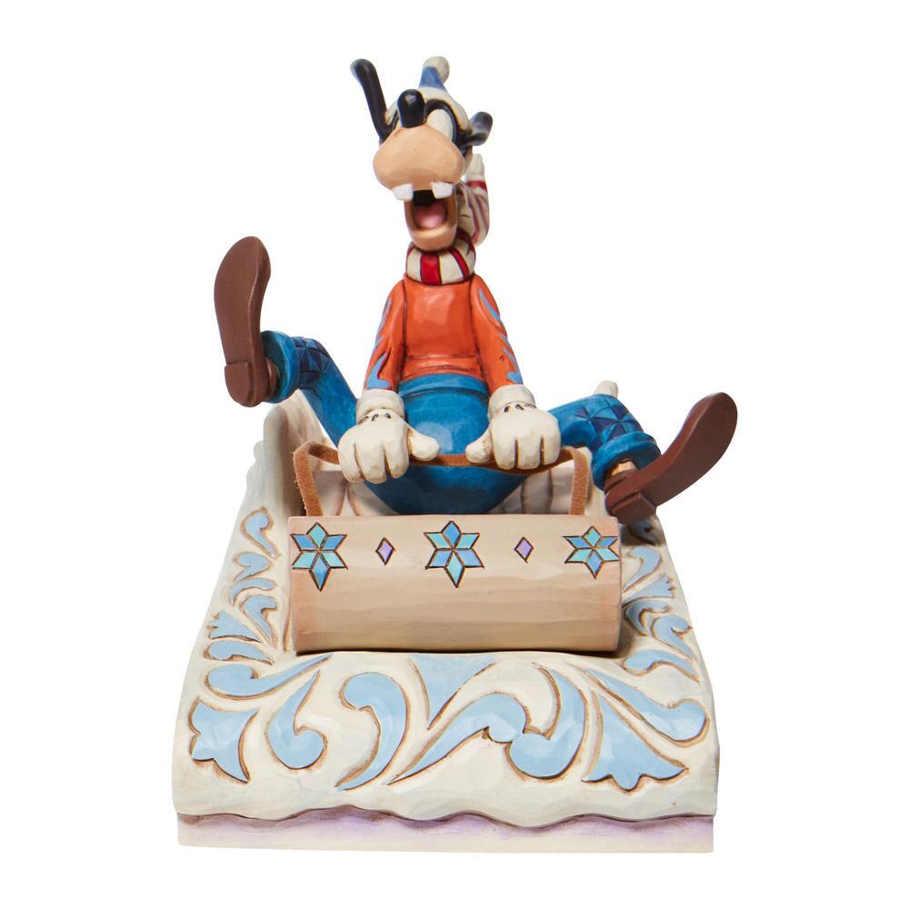 Jim Shore Disney Traditions: Goofy Sledding Figurine sparkle-castle