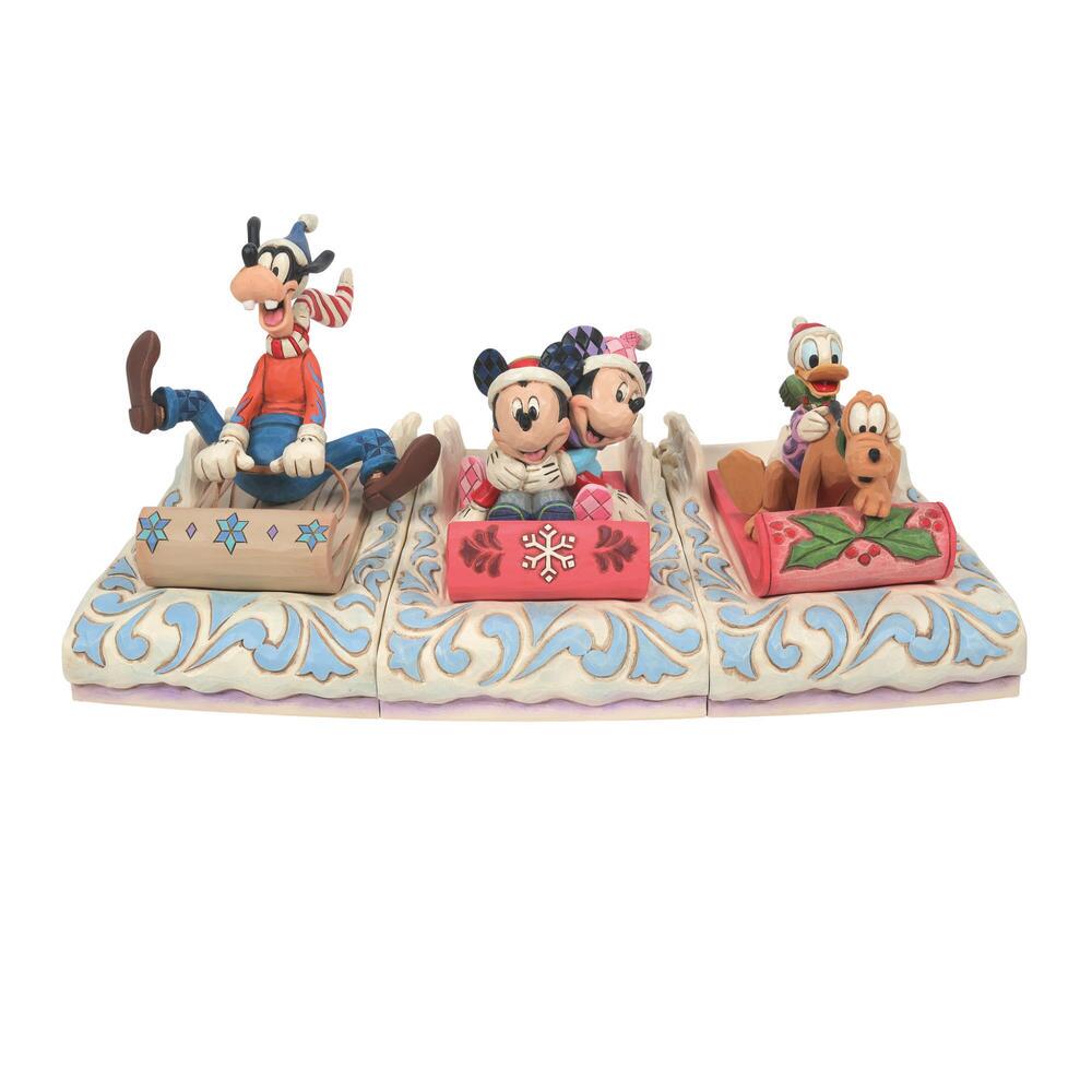 Jim Shore Disney Traditions: Goofy Sledding Figurine sparkle-castle