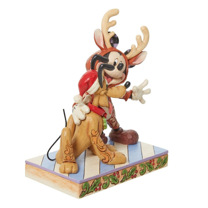 Jim Shore Disney Traditions: Mickey Reindeer with Pluto Santa Figurine sparkle-castle