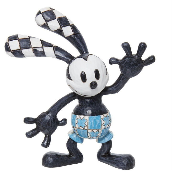 Jim Shore Disney Traditions: Mini Oswald Figurine sparkle-castle