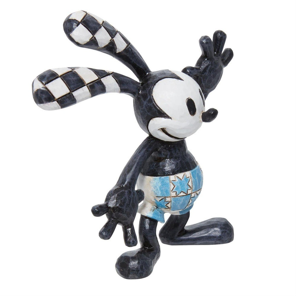 Jim Shore Disney Traditions: Mini Oswald Figurine sparkle-castle