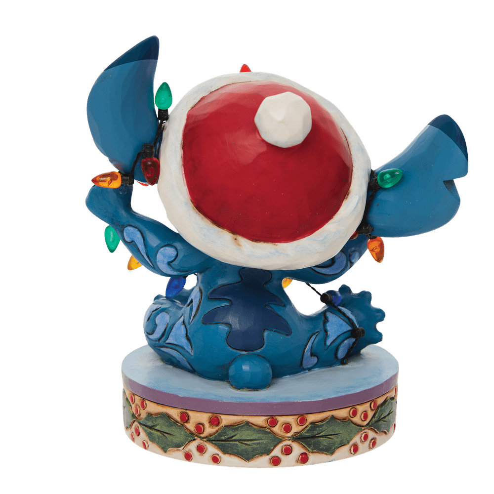 Jim Shore Disney Traditions: Stitch Wrapped Christmas Lights Figurine sparkle-castle