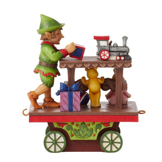 Jim Shore Heartwood Creek: Elf with Toys Train Car Figurine sparkle-castle