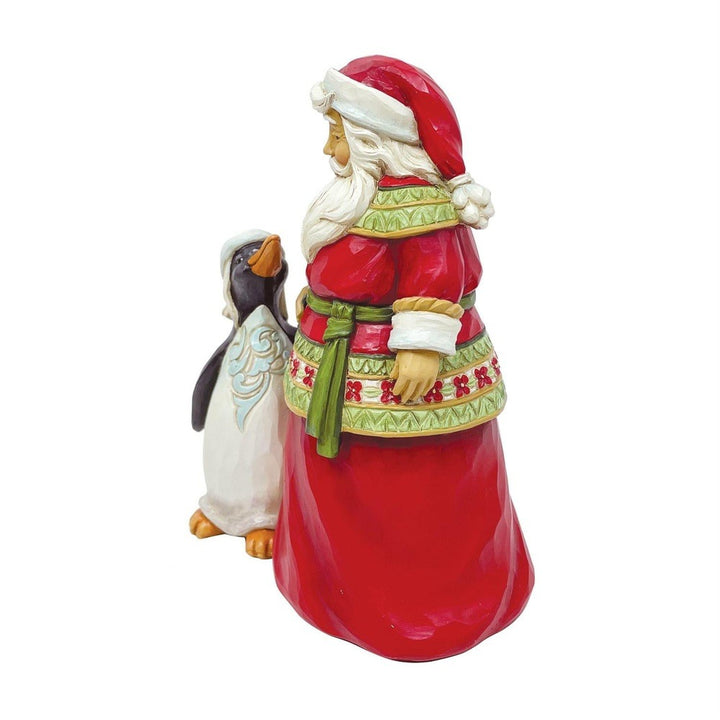 Jim Shore Heartwood Creek: Pint Sized Santa with Penguin Figurine sparkle-castle