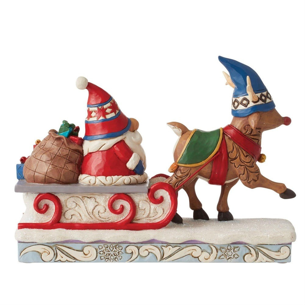 Jim Shore Heartwood Creek: Reindeer Pulling Gnome Sled Figurine sparkle-castle