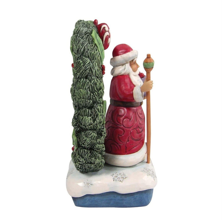 Jim Shore Heartwood Creek: Santa by Light Up Wreath Figurine sparkle-castle