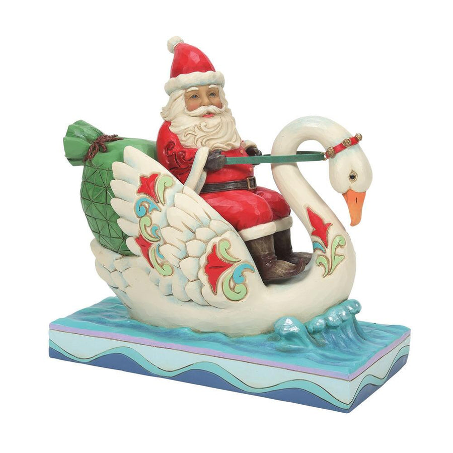 Jim Shore Heartwood Creek: Santa Riding Swan Figurine sparkle-castle