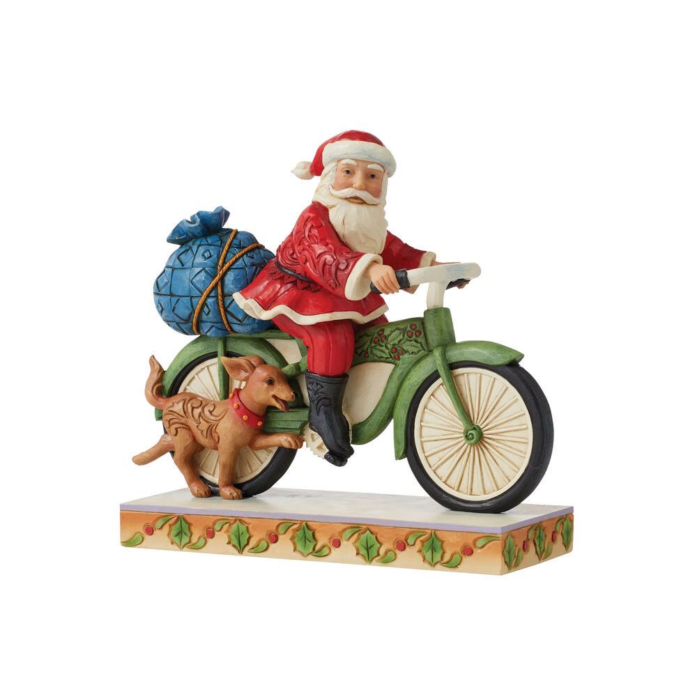 Jim Shore Heartwood Creek: Santa Riding Bicycle Figurine sparkle-castle