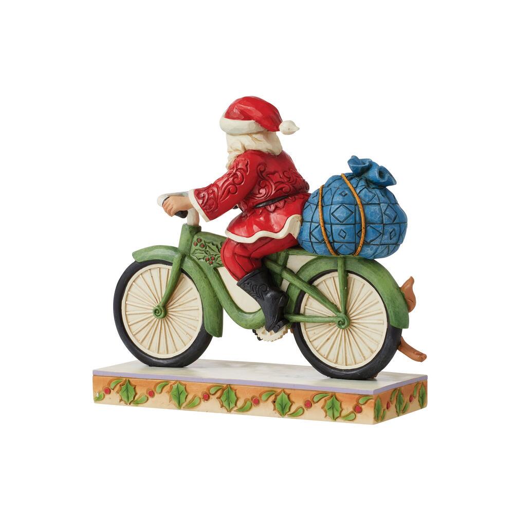 Jim Shore Heartwood Creek: Santa Riding Bicycle Figurine sparkle-castle