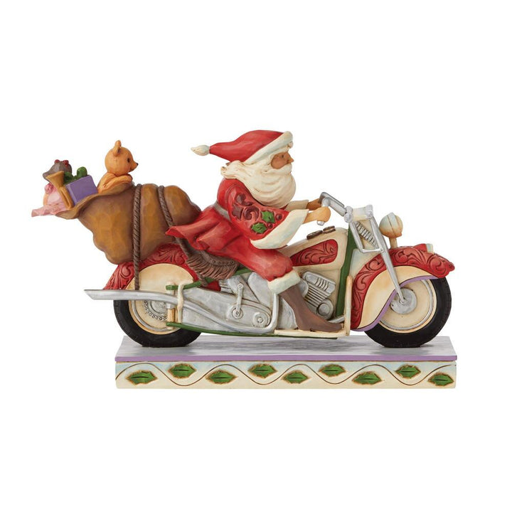 Jim Shore Heartwood Creek: Santa Riding Motorcycle Figurine sparkle-castle