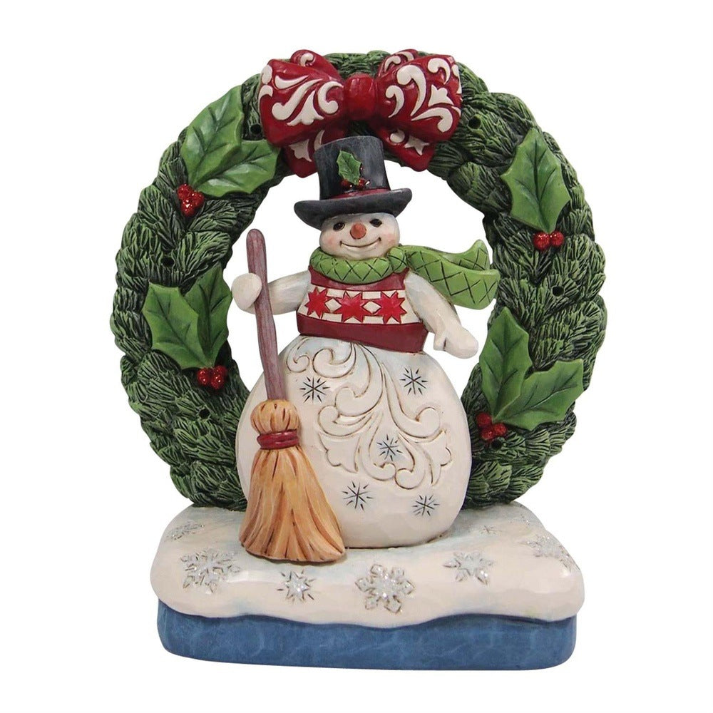 Jim Shore Heartwood Creek: Snowman by Light Up Wreath Figurine sparkle-castle