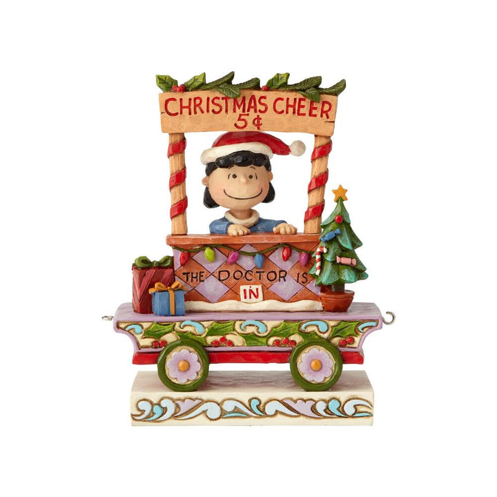 Jim Shore Peanuts: Lucy Christmas Train Car Figurine sparkle-castle