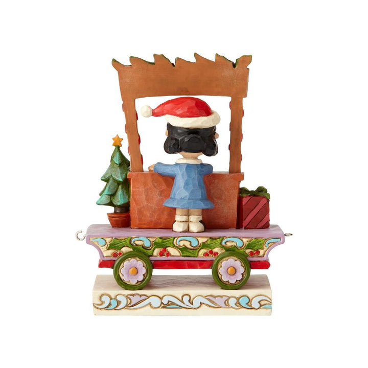 Jim Shore Peanuts: Lucy Christmas Train Car Figurine sparkle-castle