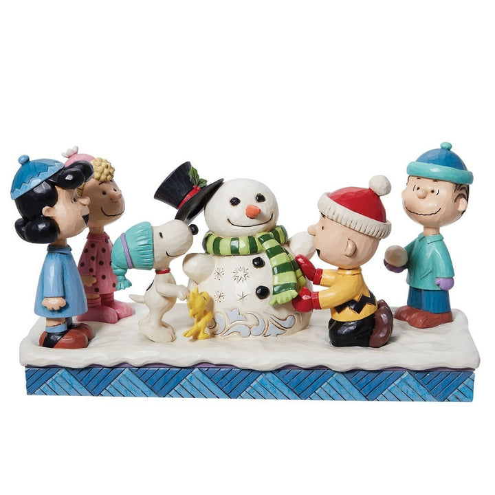 Jim Shore Peanuts: Peanuts Gang Building A Snowman Figurine sparkle-castle