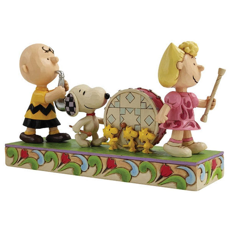 Jim Shore Peanuts: Peanuts Parade Figurine sparkle-castle