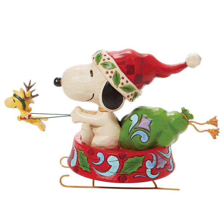 Jim Shore Peanuts: Santa Snoopy Dog Bowl Sled Figurine sparkle-castle