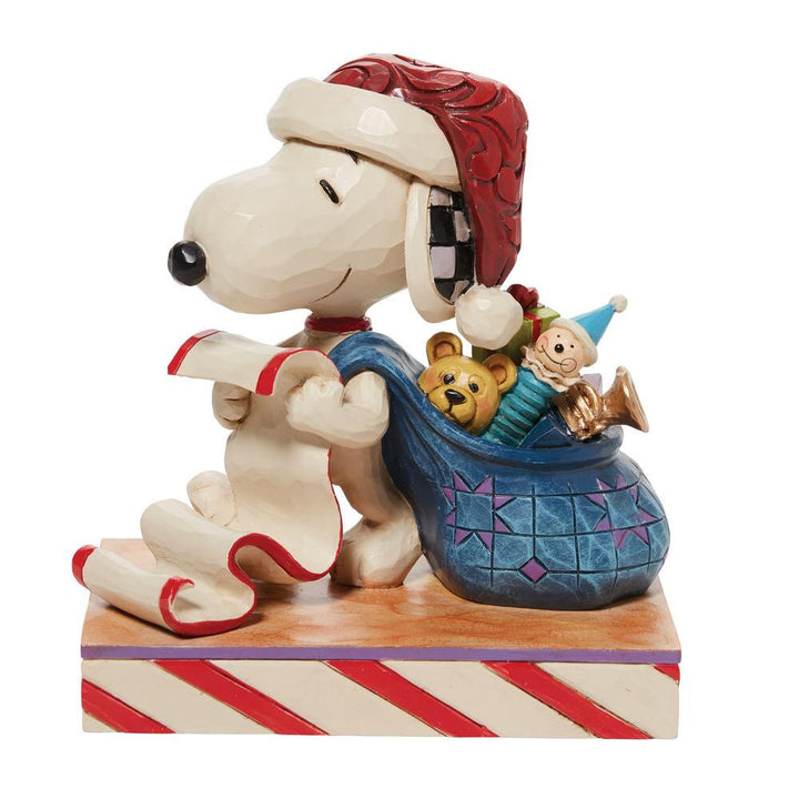 Jim Shore Peanuts: Santa Snoopy List Bag Figurine sparkle-castle
