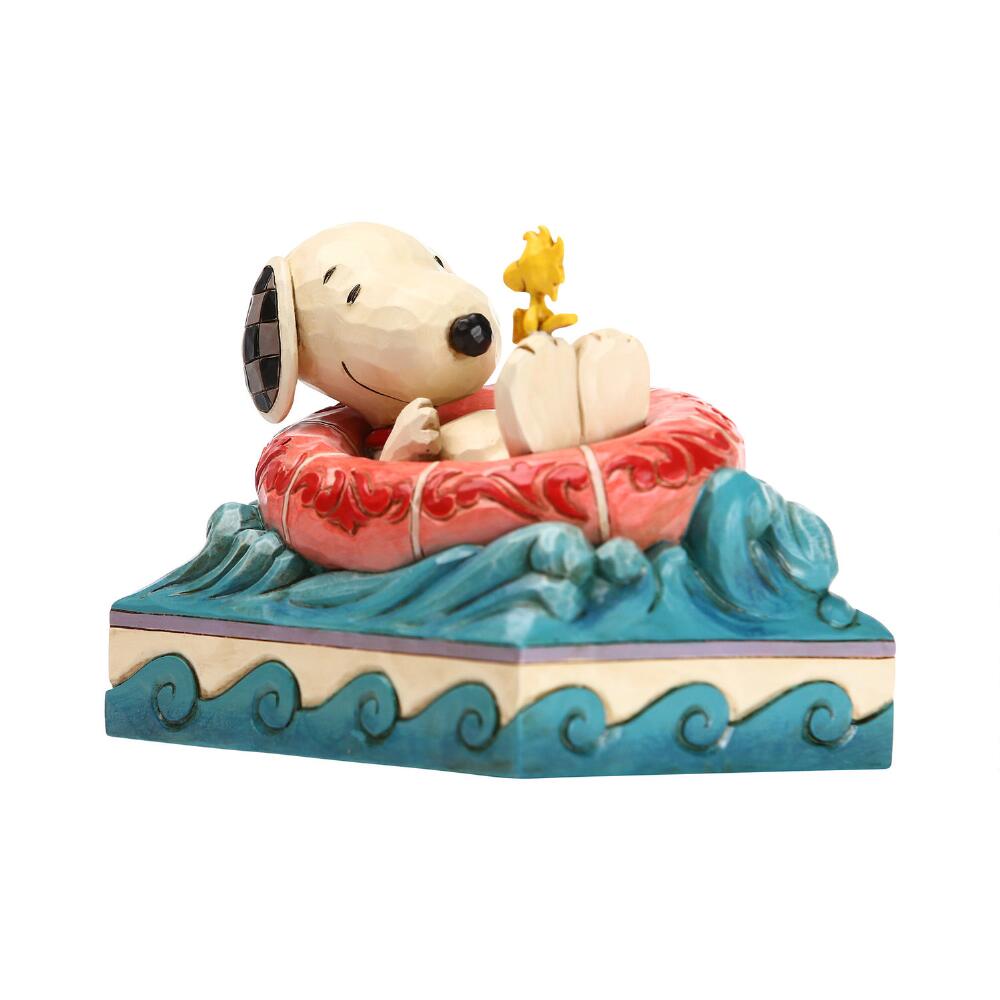 Jim Shore Peanuts: Snoopy Woodstock Floatie Figurine sparkle-castle