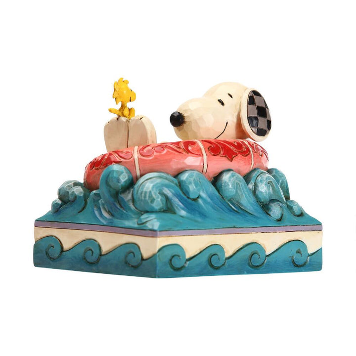 Jim Shore Peanuts: Snoopy Woodstock Floatie Figurine sparkle-castle