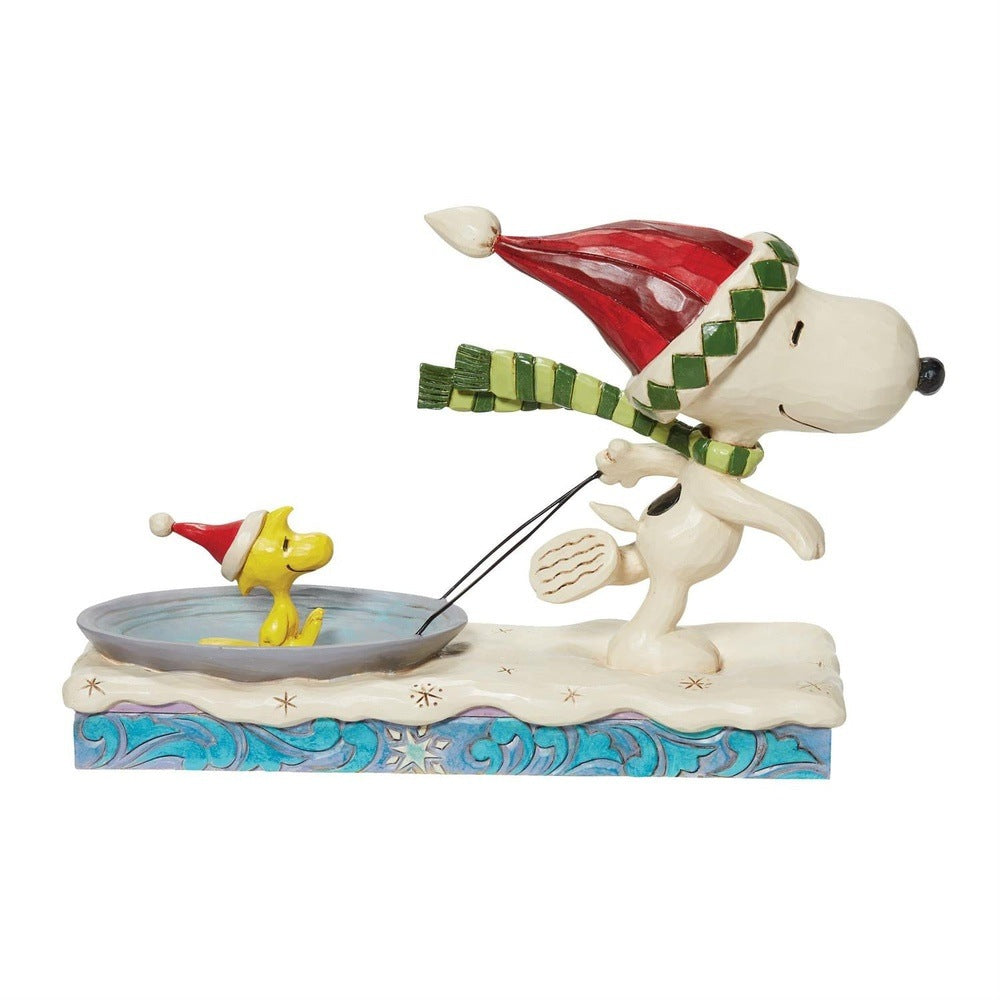 Jim Shore Peanuts: Snoopy Pulling Woodstock on Saucer Figurine sparkle-castle
