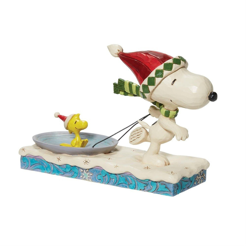 Jim Shore Peanuts: Snoopy Pulling Woodstock on Saucer Figurine sparkle-castle