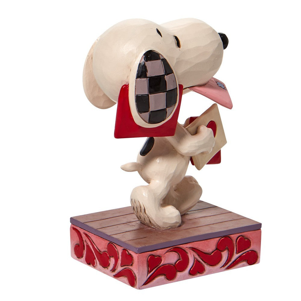 Jim Shore Peanuts: Snoopy Holding Valentine Figurine sparkle-castle