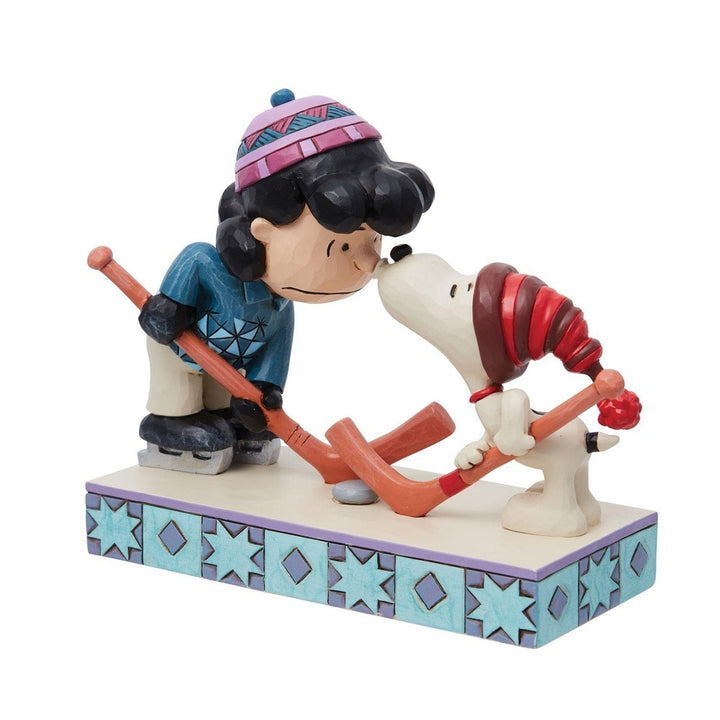 Jim Shore Peanuts: Snoopy & Lucy playing Hockey Figurine sparkle-castle