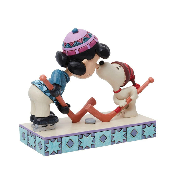Jim Shore Peanuts: Snoopy & Lucy playing Hockey Figurine sparkle-castle