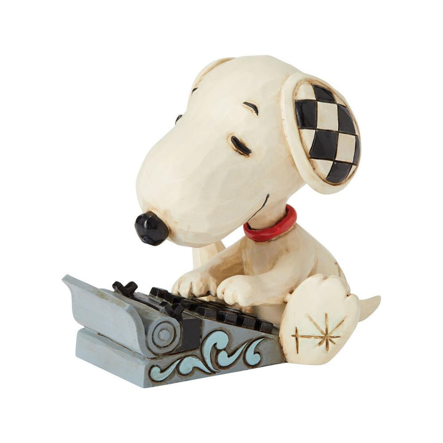 Jim Shore Peanuts: Snoopy Typing Mini Figurine sparkle-castle