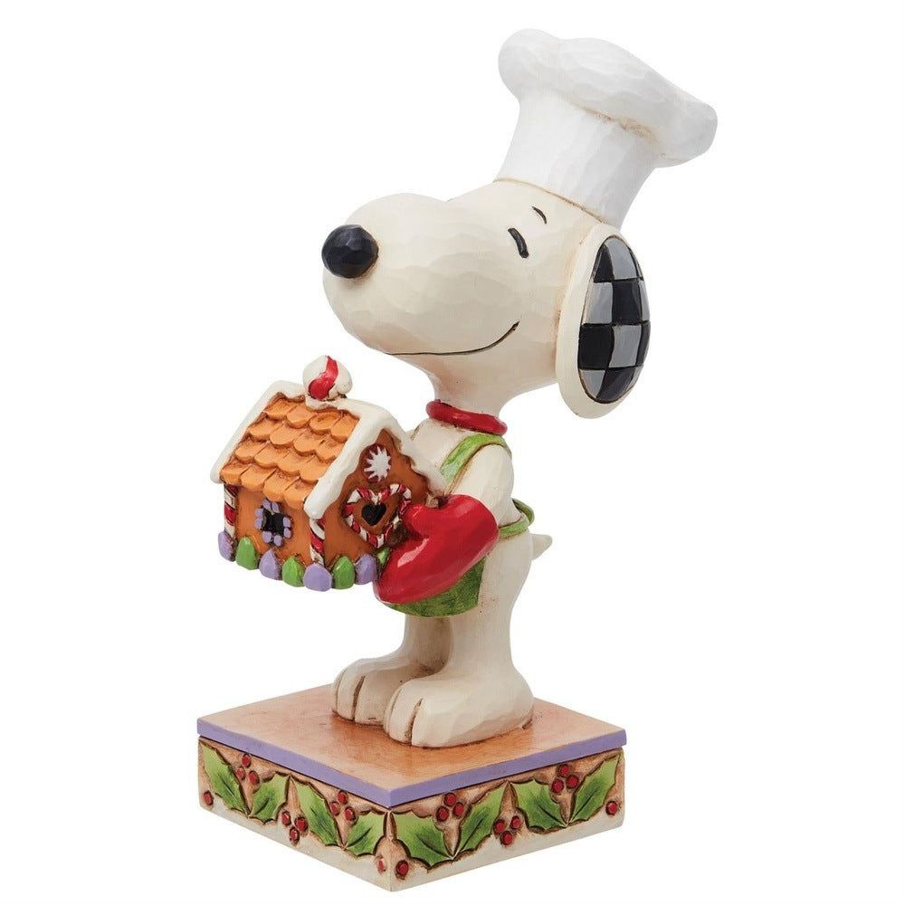 Jim Shore Peanuts: Snoopy with Gingerbread House Figurine sparkle-castle