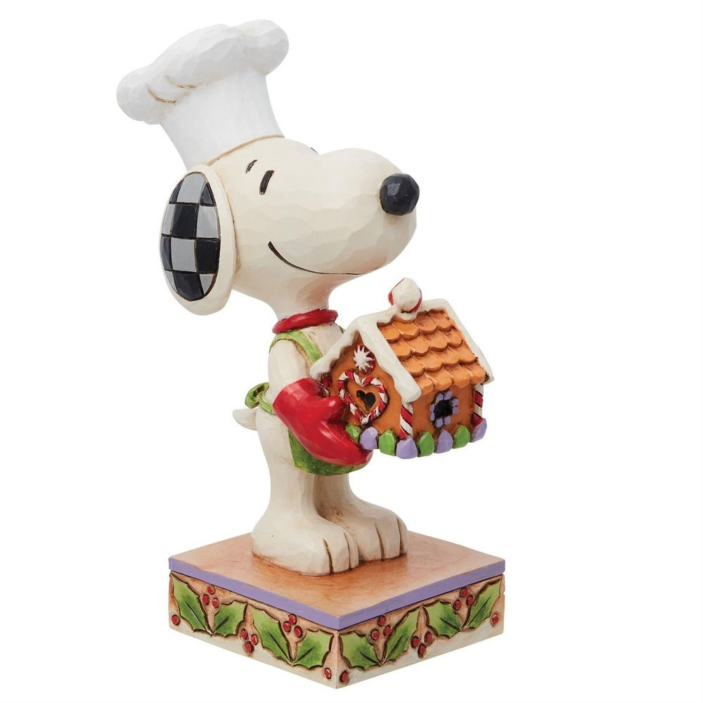 Jim Shore Peanuts: Snoopy with Gingerbread House Figurine sparkle-castle