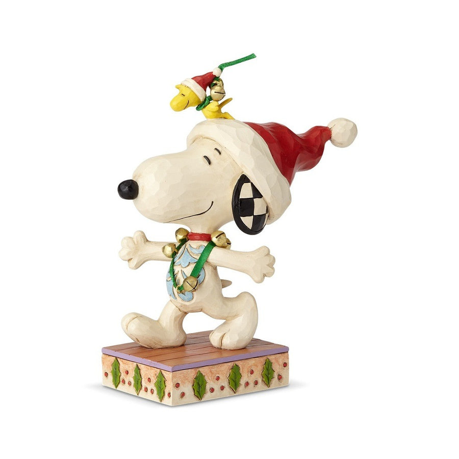 Jim Shore Peanuts: Snoopy with Woodstock with Jingle Bells Figurine sparkle-castle