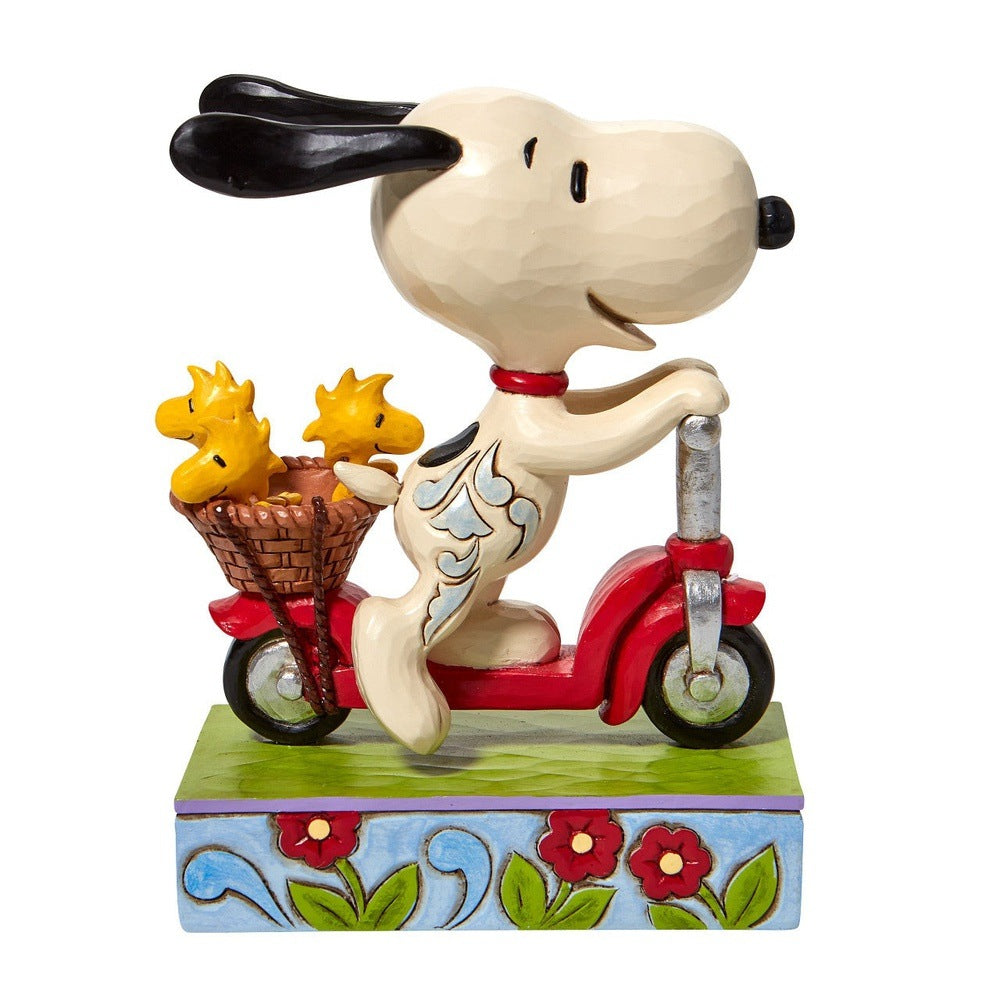 Jim Shore Peanuts: Snoopy Woodstock Riding Scooter Figurine sparkle-castle
