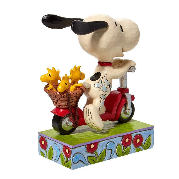 Jim Shore Peanuts: Snoopy Woodstock Riding Scooter Figurine sparkle-castle