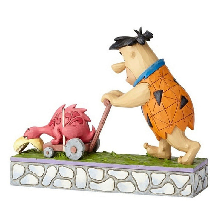 Jim Shore Flintstones: Fred Flintstone Mowing Lawn Figurine sparkle-castle