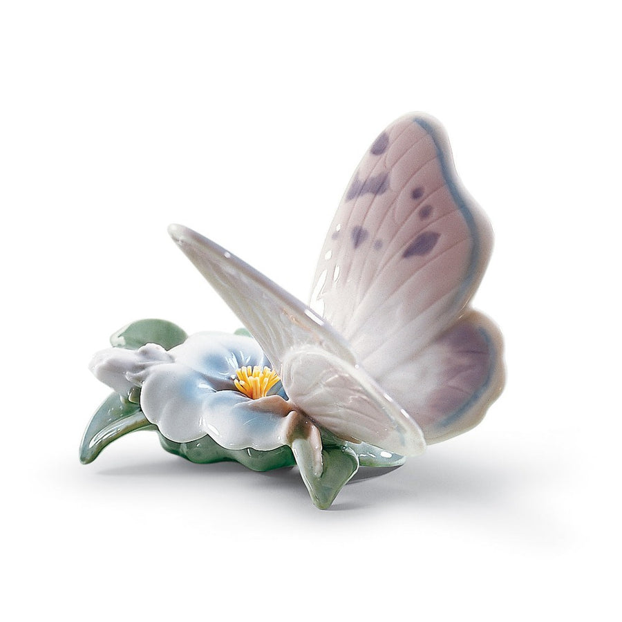Lladró Lovely World Collection: Refreshing Pause Butterfly Figurine sparkle-castle